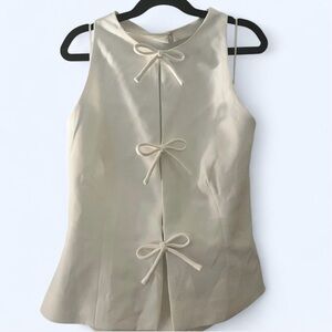 Elegant Cream Sleeveless Top with Bow Accents
